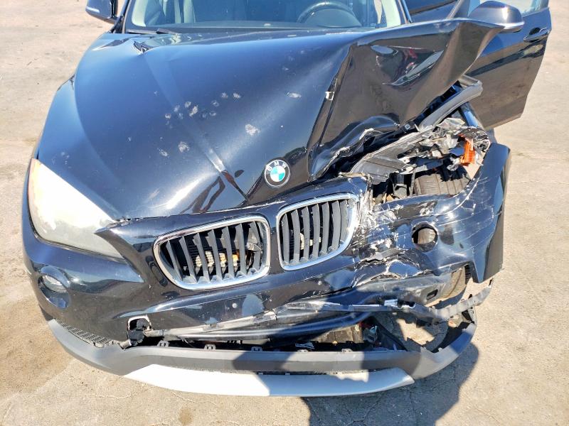 Photo 11 from auction – 2013 BMW X1 with VIN WBAVL1C54DVR89680