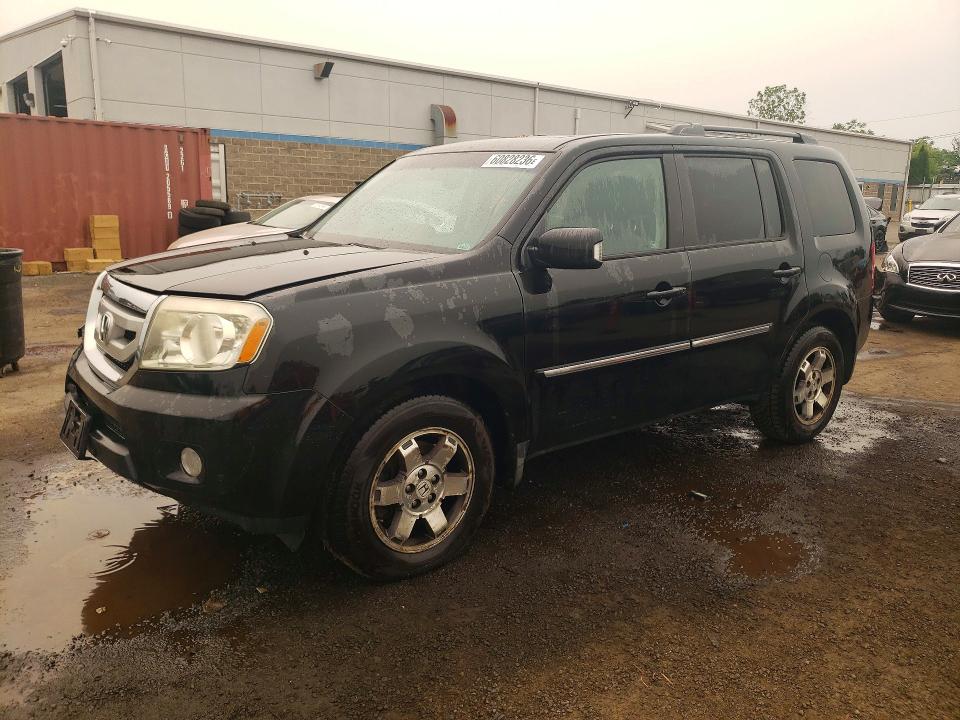 HONDA PILOT 2011 with VIN 5FNYF4H91BB022086 - Photo from auction