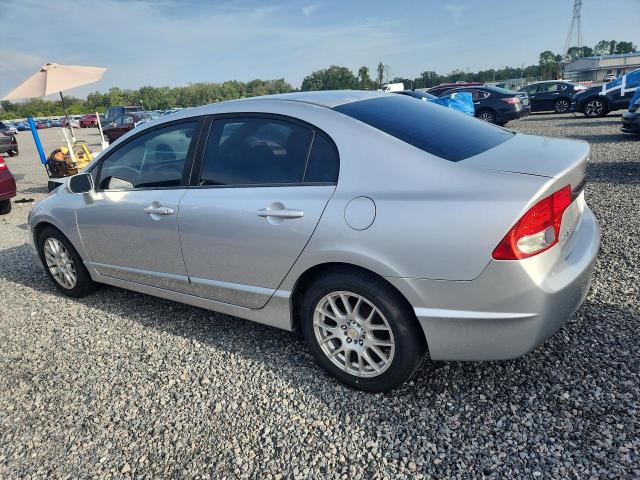 Photo 2 from auction – 2011 HONDA CIVIC with VIN 19XFA1F53BE032452