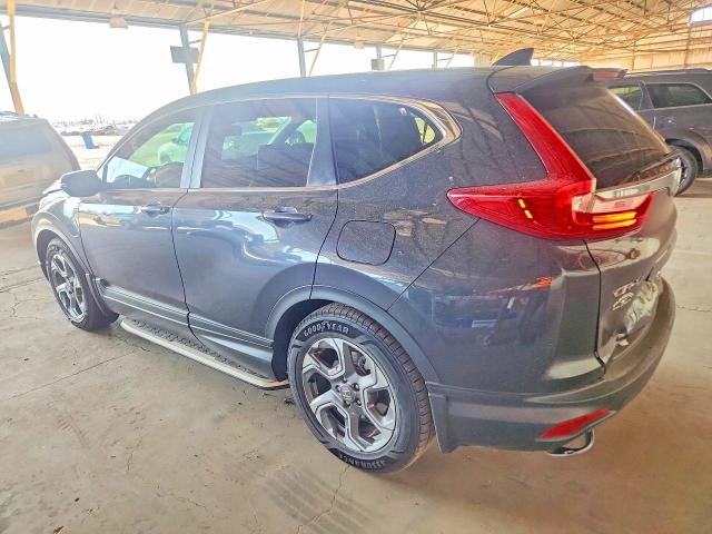 Photo 2 from auction – 2017 HONDA CR-V with VIN 2HKRW1H82HH513299
