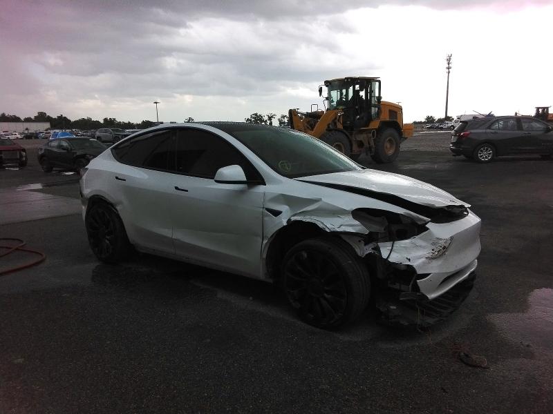 Photo 4 from auction – 2022 TESLA MODEL Y with VIN 7SAYGDEF0NF539958