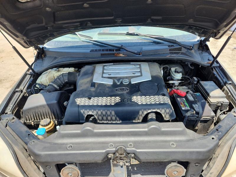 Photo 12 from auction – 2004 KIA SORENTO with VIN KNDJC733645182161