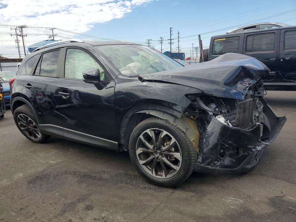 Foto 4 de la subasta – 2016 MAZDA CX-5 con VIN JM3KE2DY1G0840120