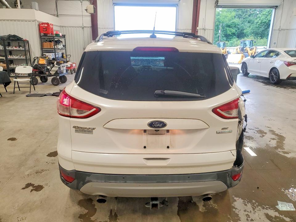 Photo 6 from auction – 2016 FORD ESCAPE with VIN 1FMCU0GX5GUB29984