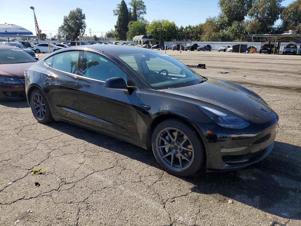 Photo 4 from auction – 2023 TESLA MODEL 3 with VIN 5YJ3E1EA7PF559207