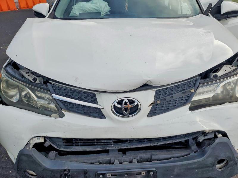 Photo 11 from auction – 2015 TOYOTA RAV4 with VIN JTMWFREV1FJ044528