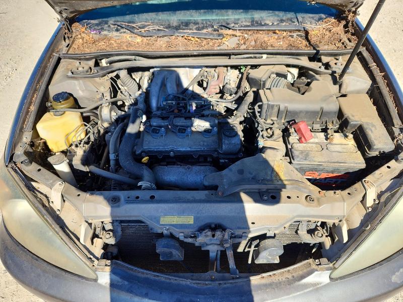 Photo 11 from auction – 2002 TOYOTA CAMRY with VIN JTDBF30KX20026098