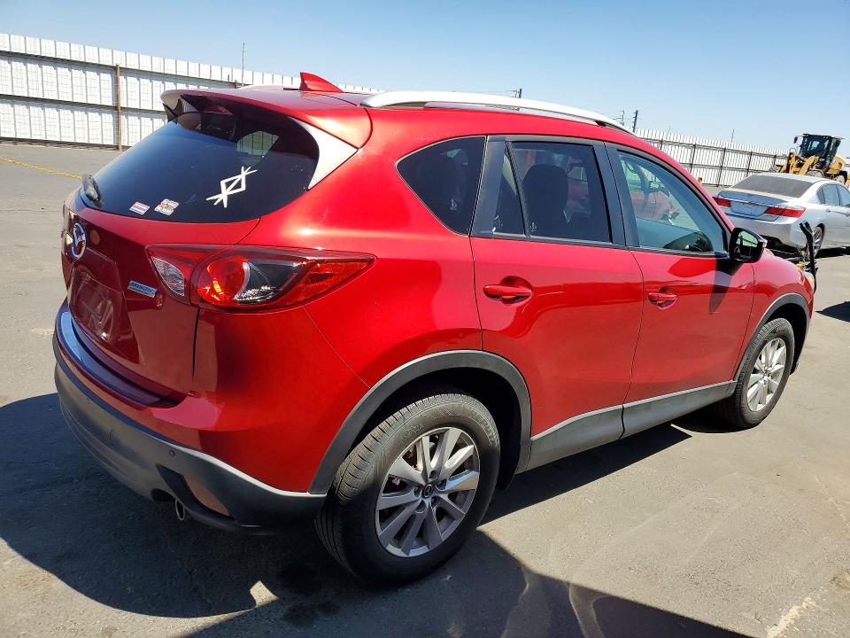 Photo 3 from auction – 2016 MAZDA CX-5 with VIN JM3KE2CY8G0626792