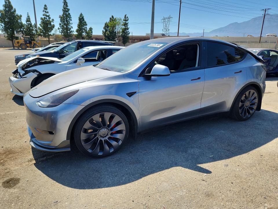TESLA MODEL Y 2024 with VIN 7SAYGDEF9RA296461 - Photo from auction