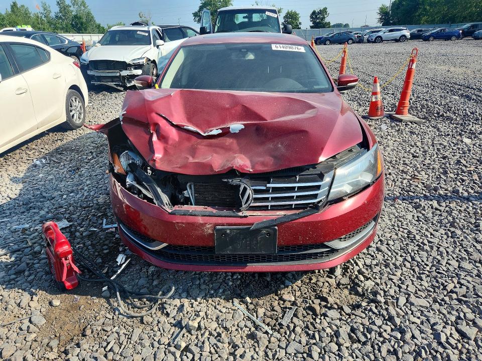 Photo 5 from auction – 2015 VOLKSWAGEN PASSAT with VIN 1VWBV7A36FC095938