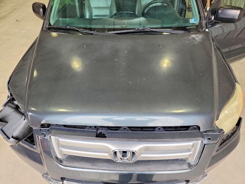 Photo 12 from auction – 2006 HONDA PILOT with VIN 5FNYF28146B032177