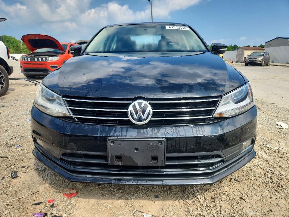 Photo 5 from auction – 2015 VOLKSWAGEN JETTA with VIN 3VWD17AJXFM357610