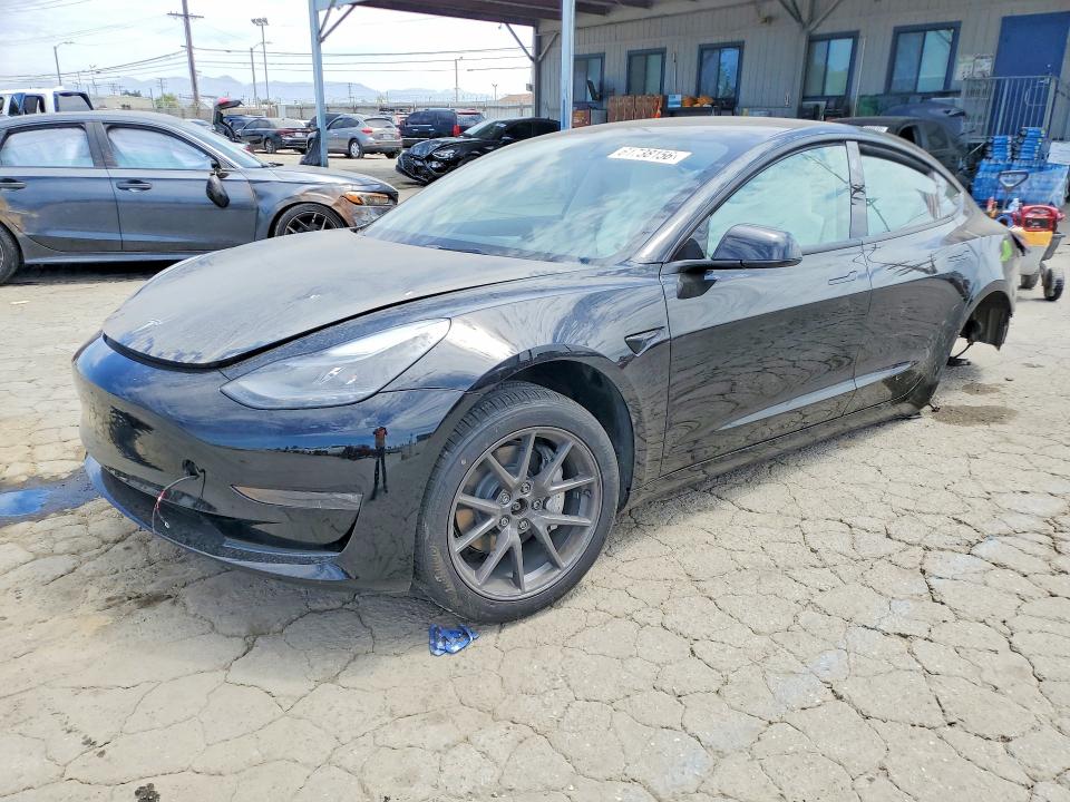 TESLA MODEL 3 2023 with VIN 5YJ3E1EB5PF706584 - Photo from auction