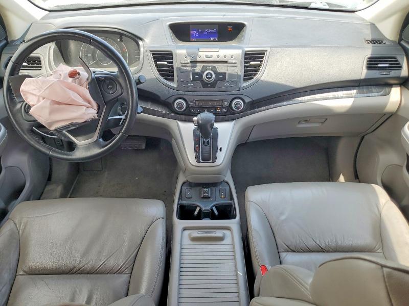 Photo 8 from auction – 2012 HONDA CR-V with VIN JHLRM3H74CC012527