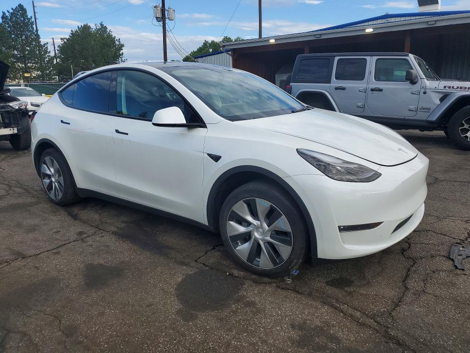 Photo 4 from auction – 2023 TESLA MODEL Y with VIN 7SAYGDEE5PF799444