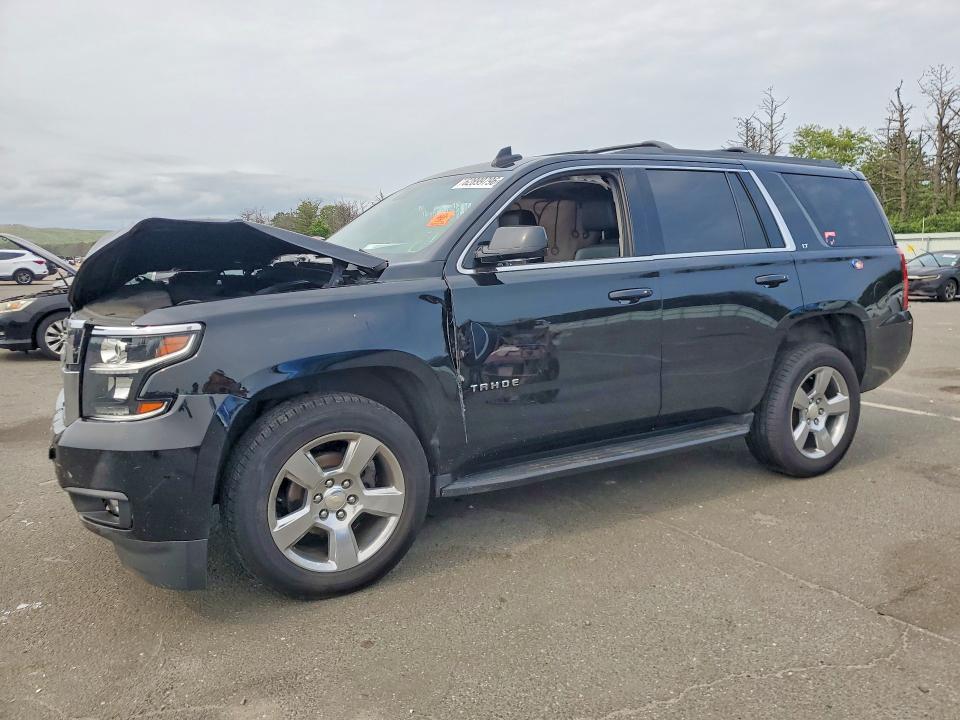 CHEVROLET TAHOE 2019 with VIN 1GNSKBKC4KR107984 - Photo from auction