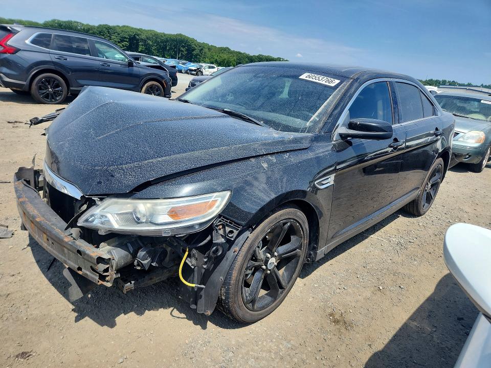 FORD TAURUS 2011 with VIN 1FAHP2KT8BG143621 - Photo from auction