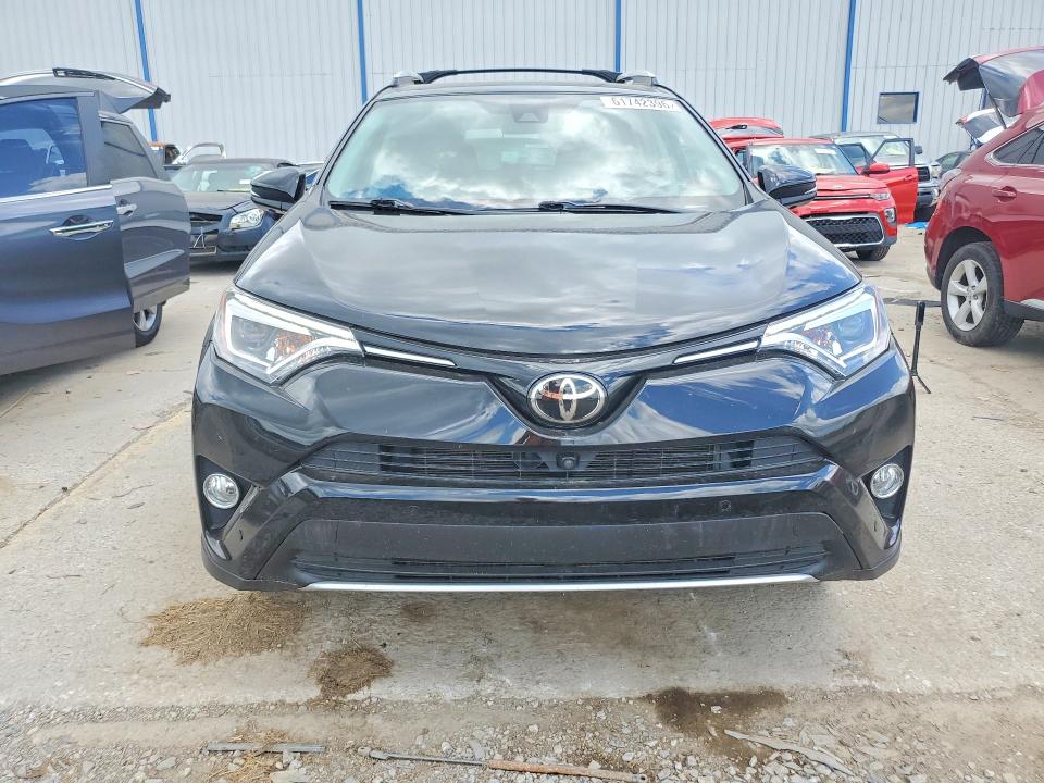 Photo 5 from auction – 2016 TOYOTA RAV4 with VIN 2T3DFREV8GW444208