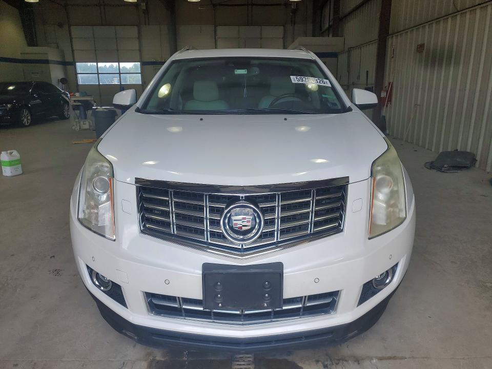 Фото 5 с аукциона – 2014 CADILLAC SRX с VIN 3GYFNDE37ES611708