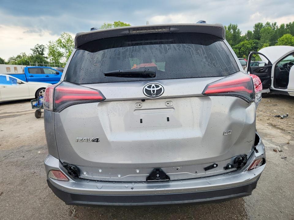 Photo 6 from auction – 2018 TOYOTA RAV4 with VIN JTMZFREV3JJ166717
