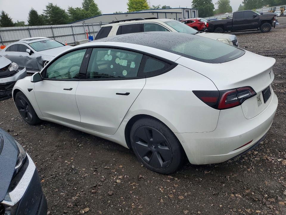 Photo 2 from auction – 2021 TESLA MODEL 3 with VIN 5YJ3E1EA0MF059076