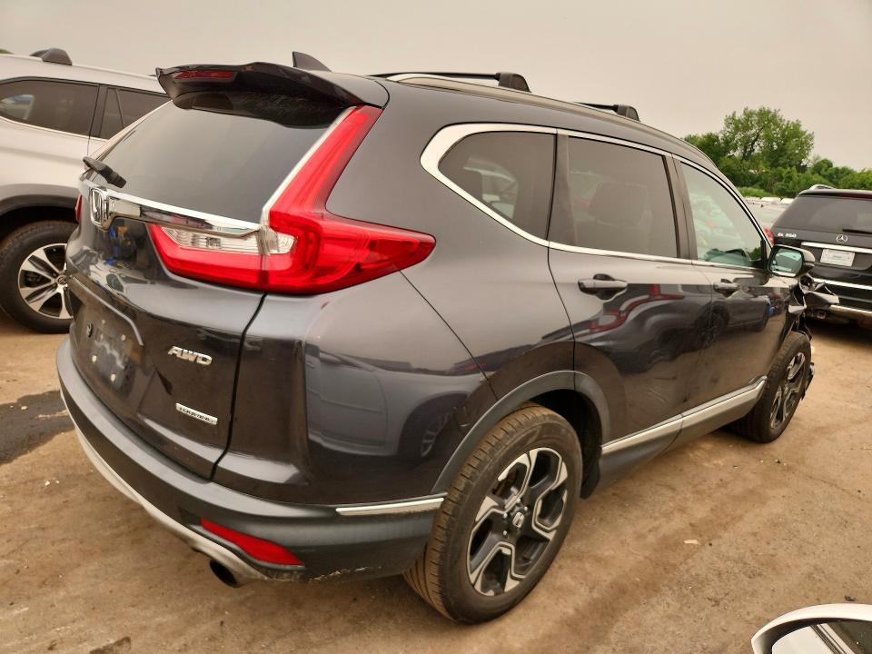Photo 3 from auction – 2017 HONDA CR-V with VIN 5J6RW2H98HL005505