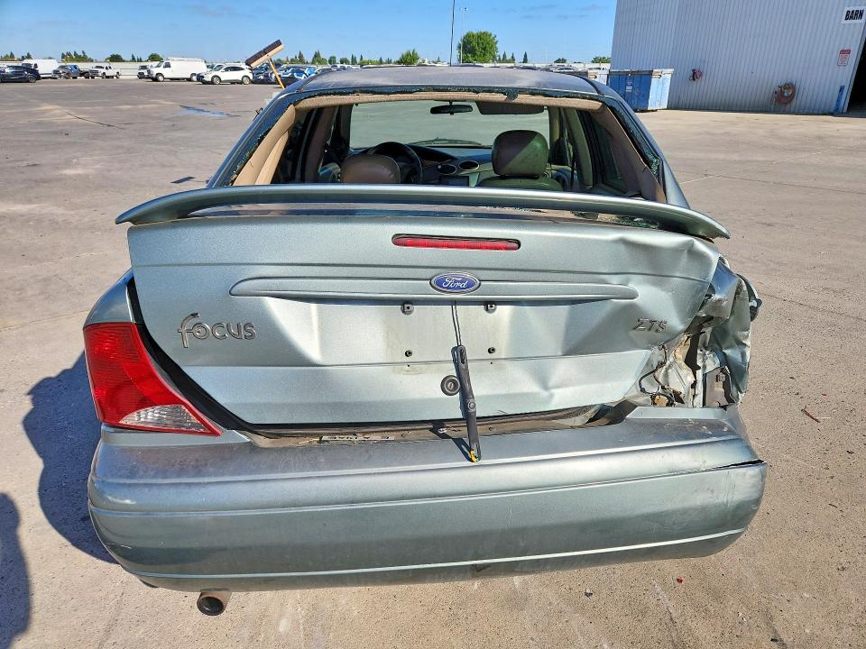 Photo 6 from auction – 2003 FORD FOCUS with VIN 1FAHP38Z13W292462
