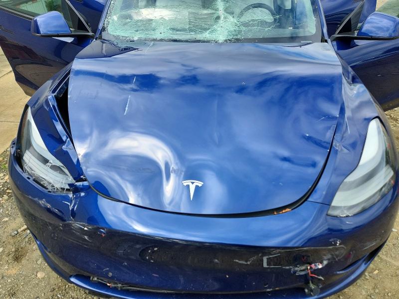 Photo 11 from auction – 2022 TESLA MODEL Y with VIN 7SAYGDEF3NF530378