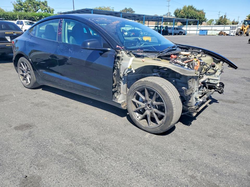 Снимка 4 от търг – 2022 TESLA MODEL 3 с VIN 5YJ3E1EB0NF136135