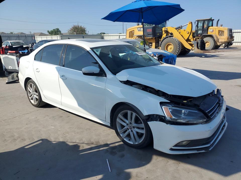 Photo 4 from auction – 2015 VOLKSWAGEN JETTA with VIN 3VWLA7AJ1FM412828