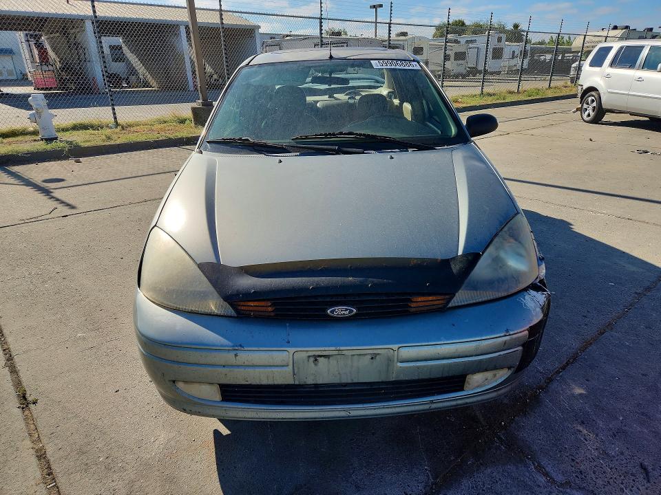 Photo 5 from auction – 2003 FORD FOCUS with VIN 1FAHP38Z13W292462