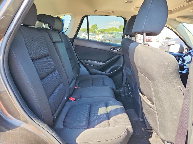 Photo 11 from auction – 2016 MAZDA CX-5 with VIN JM3KE2CY1G0738088