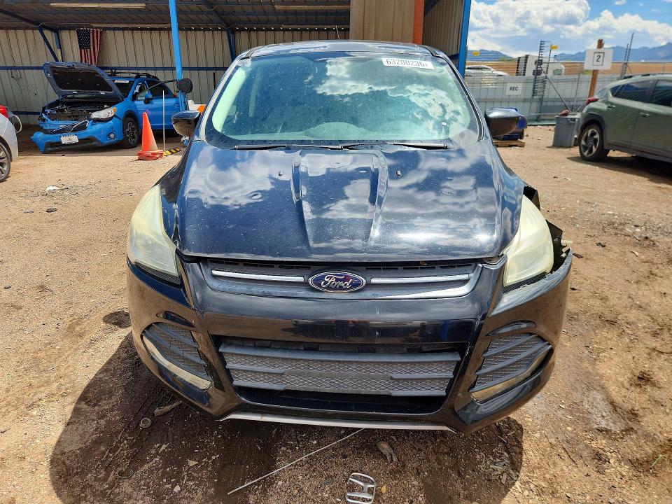 Photo 5 from auction – 2015 FORD ESCAPE with VIN 1FMCU0G91FUC80093