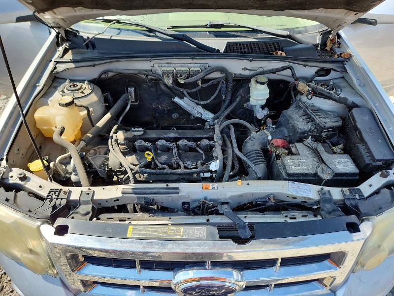 Photo 12 from auction – 2010 FORD ESCAPE with VIN 1FMCU0E70AKA29491
