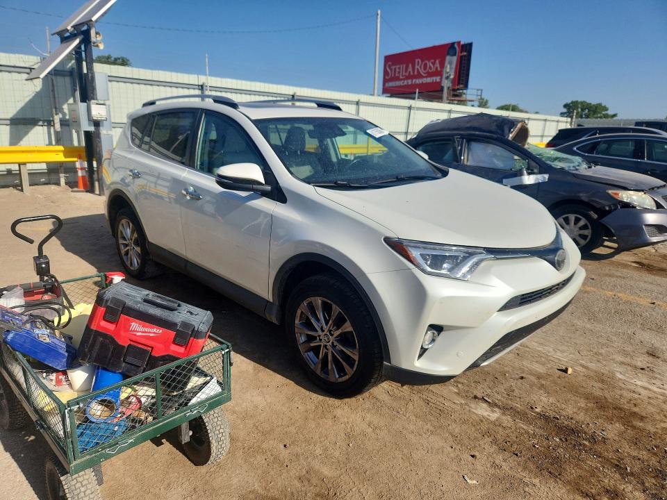 Photo 4 from auction – 2016 TOYOTA RAV4 with VIN 2T3YFREV0GW273780