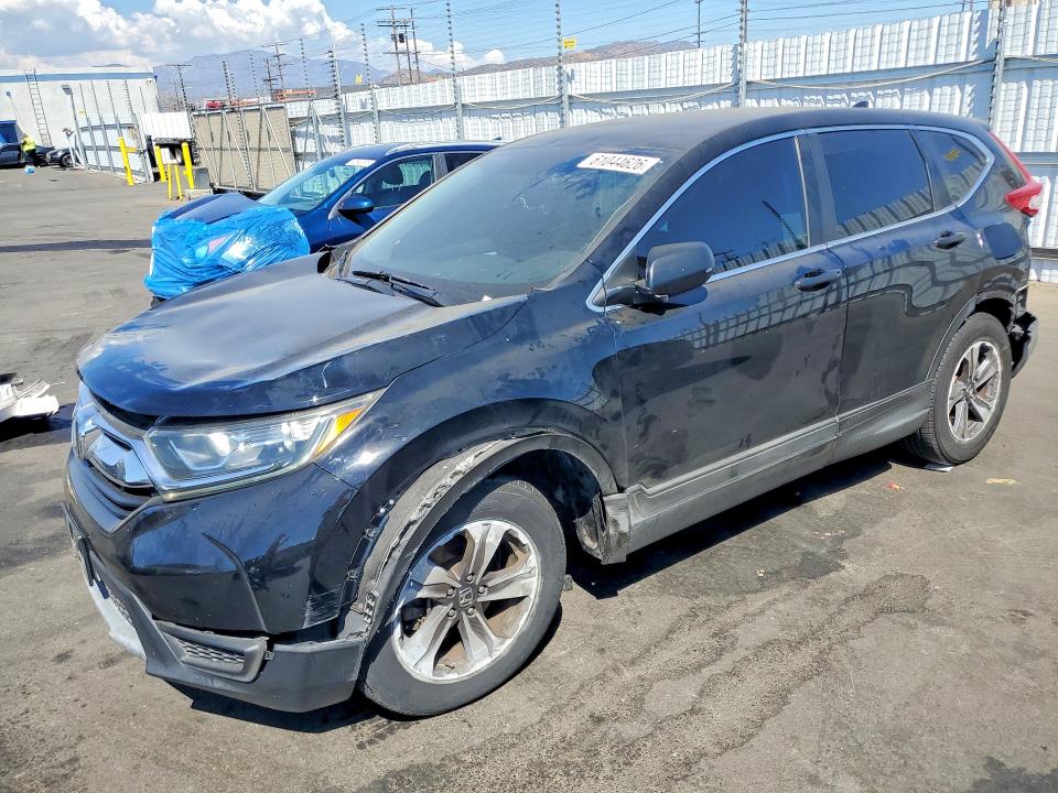 HONDA CR-V 2017 with VIN 7FARW5H35HE014284 - Photo from auction