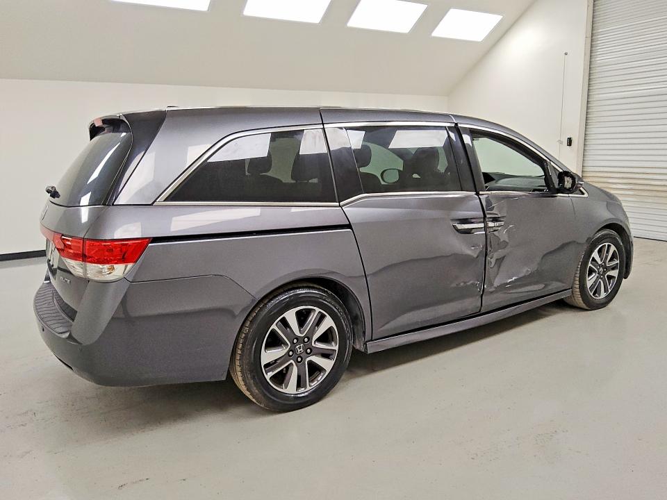 Photo 3 from auction – 2014 HONDA ODYSSEY with VIN 5FNRL5H91EB094879