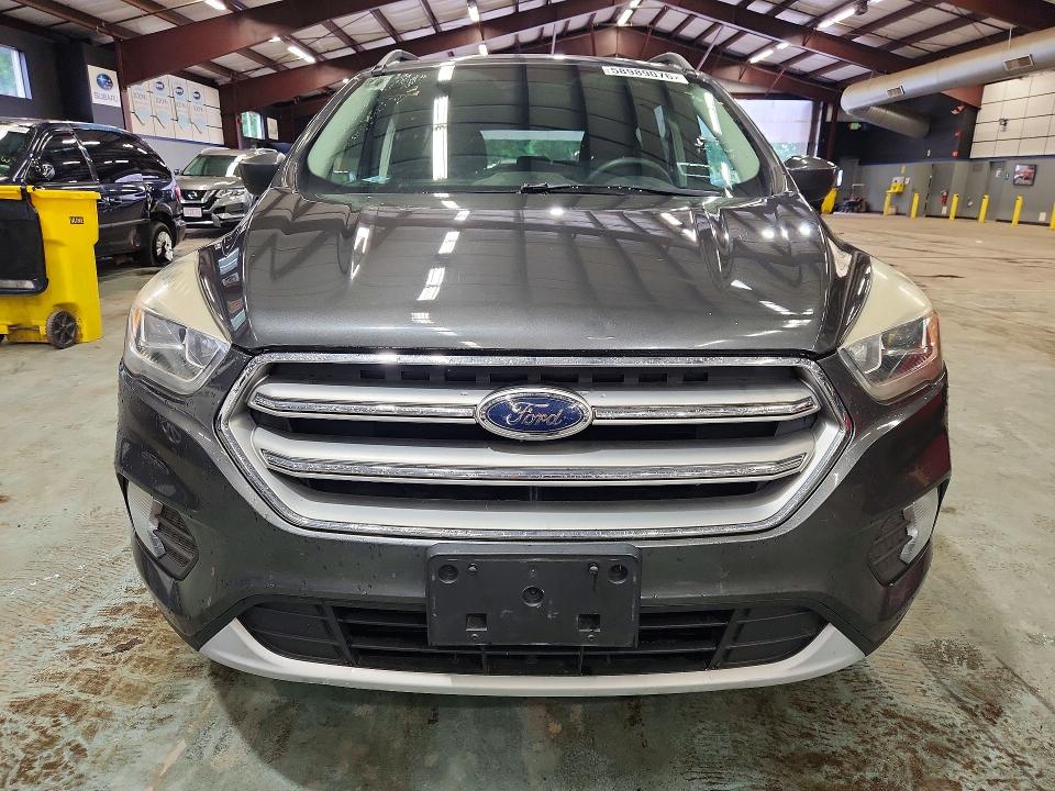 Photo 5 from auction – 2017 FORD ESCAPE with VIN 1FMCU9GD8HUB94372
