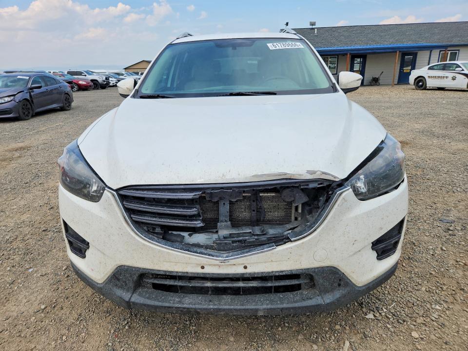 Photo 5 from auction – 2016 MAZDA CX-5 with VIN JM3KE2BY4G0687560