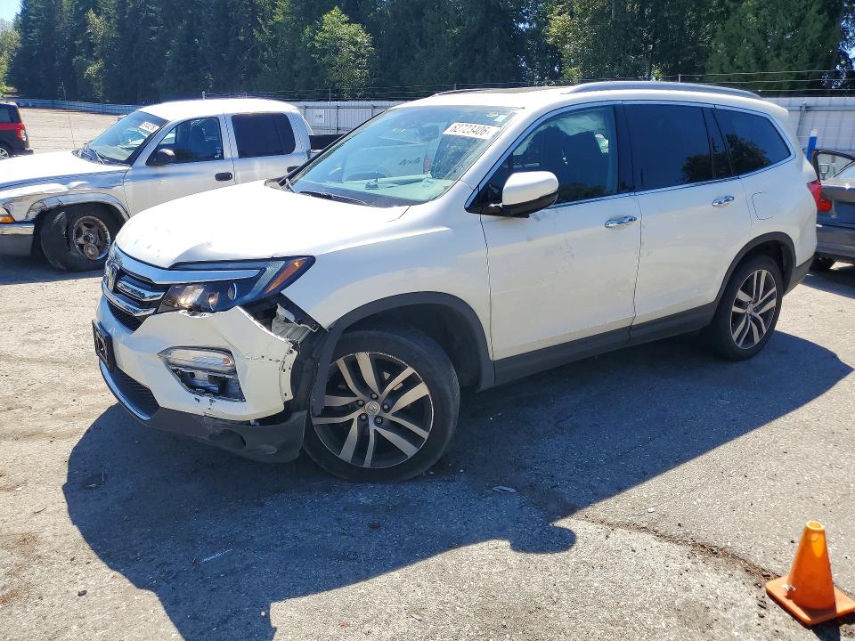 HONDA PILOT 2017 with VIN 5FNYF6H94HB003049 - Photo from auction
