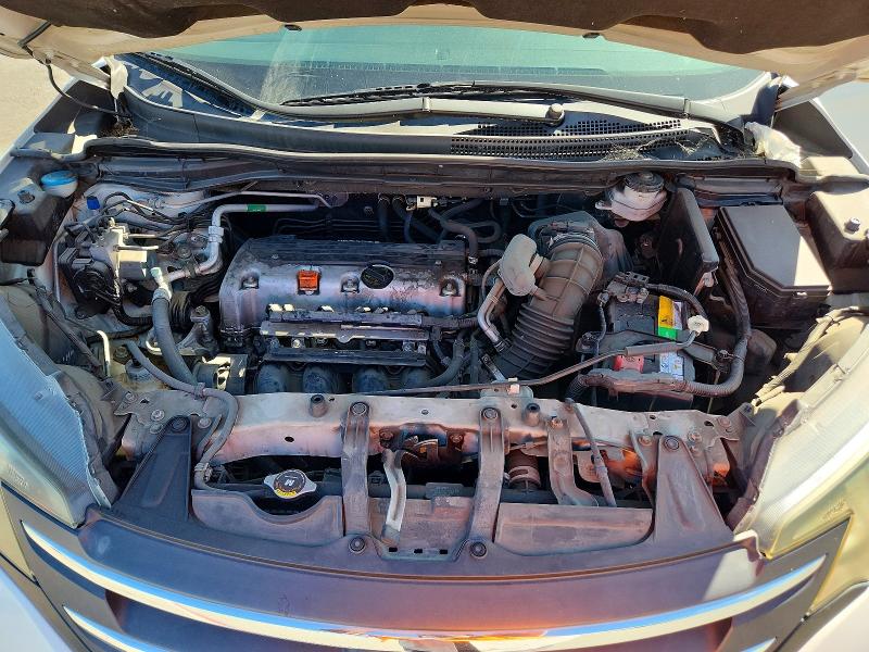 Photo 11 from auction – 2014 HONDA CR-V with VIN 5J6RM3H31EL030359