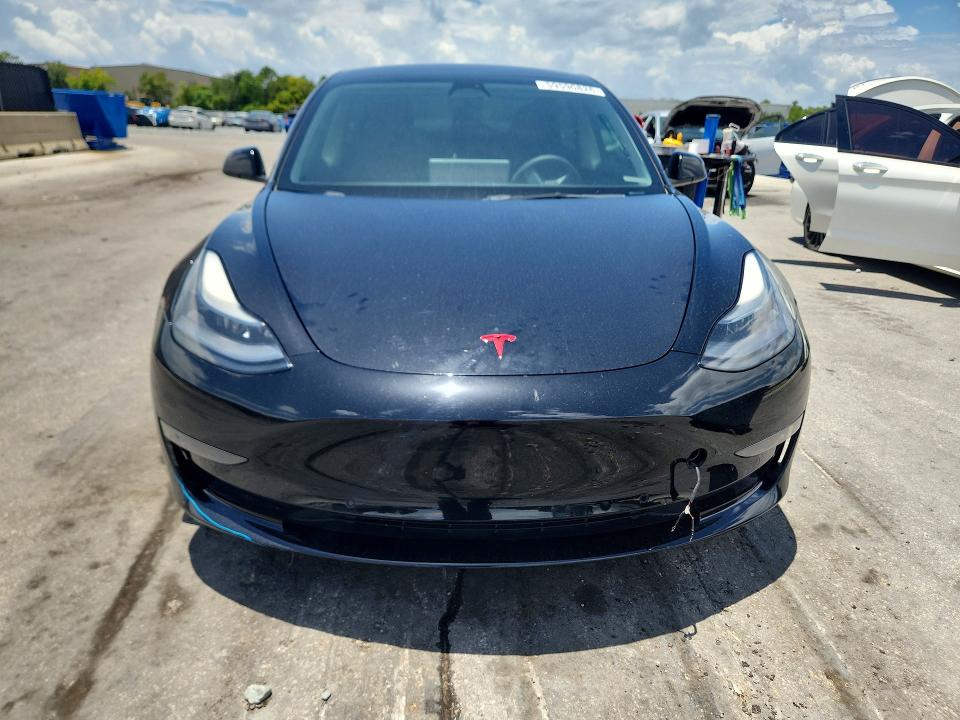 Photo 5 from auction – 2022 TESLA MODEL 3 with VIN 5YJ3E1EBXNF273163