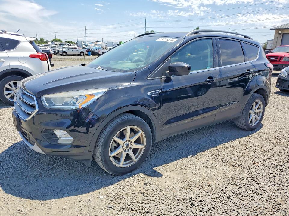 FORD ESCAPE 2017 with VIN 1FMCU0G9XHUE16787 - Photo from auction