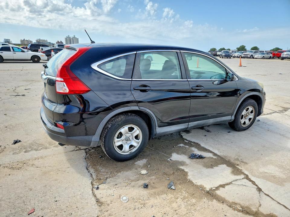 Photo 3 from auction – 2015 HONDA CR-V with VIN 3CZRM3H31FG703424