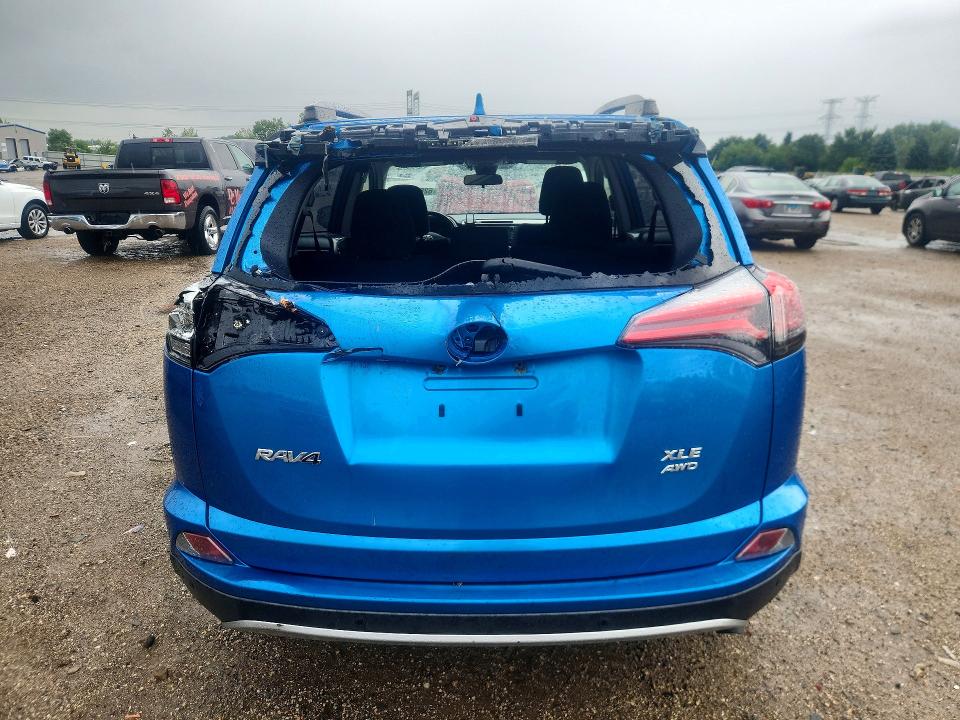 Photo 6 from auction – 2018 TOYOTA RAV4 with VIN JTMRFREV7JJ723127