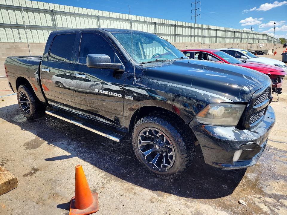 Photo 4 from auction – 2014 RAM 1500 with VIN 1C6RR6KT9ES113228