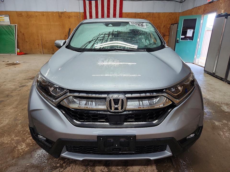 Photo 5 from auction – 2018 HONDA CR-V with VIN 7FARW2H51JE089649