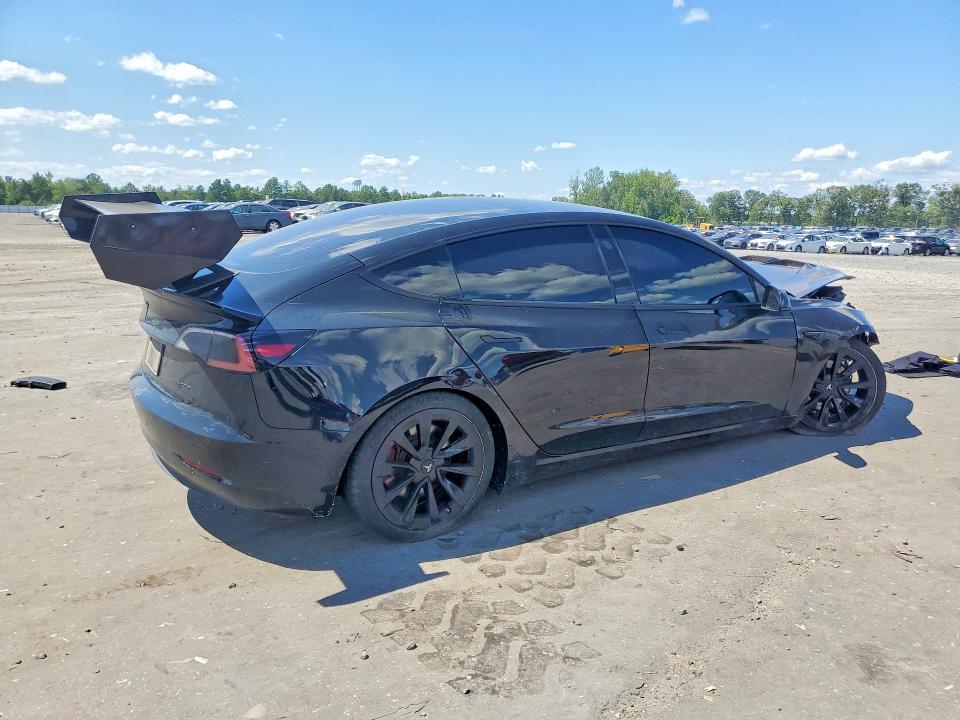Photo 3 from auction – 2021 TESLA MODEL 3 with VIN 5YJ3E1EB9MF046352