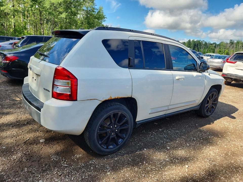 Photo 3 from auction – 2010 JEEP COMPASS with VIN 1J4NF5FB8AD563277