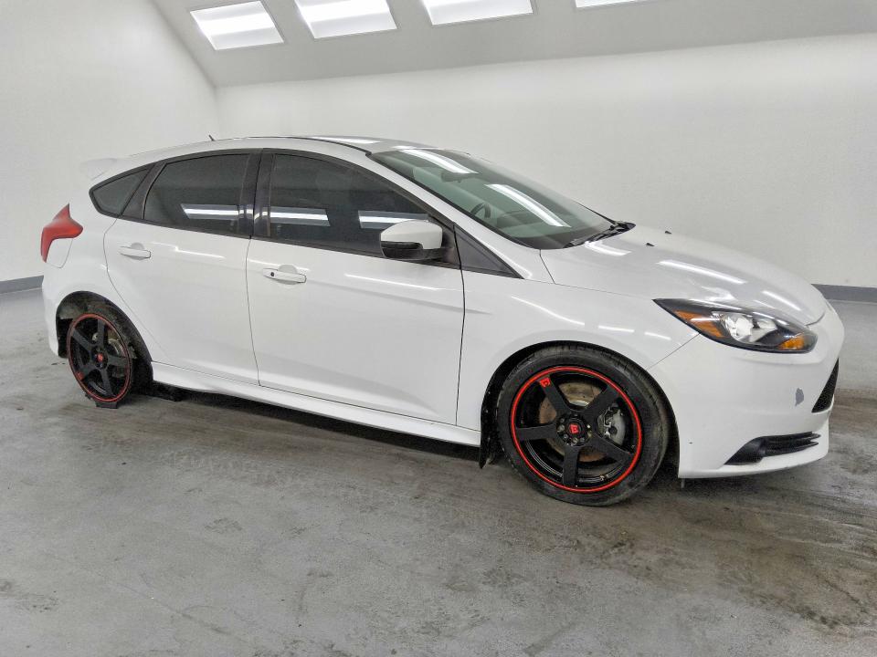 Photo 4 from auction – 2014 FORD FOCUS with VIN 1FADP3L94EL259806